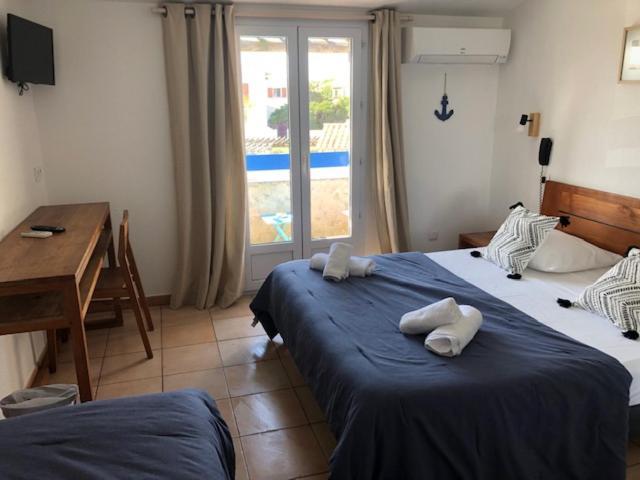 Hotel Le Bleu Marine Saintes-Maries-de-la-Mer Bagian luar foto