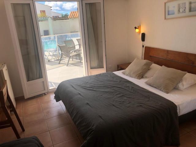 Hotel Le Bleu Marine Saintes-Maries-de-la-Mer Bagian luar foto